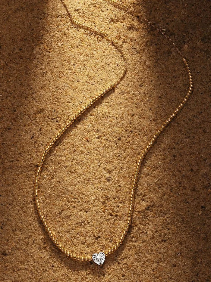 Collier APM Monaco YC6372OX en plaqué or jaune avec pendentif cœur en cristal pour femme vue 3