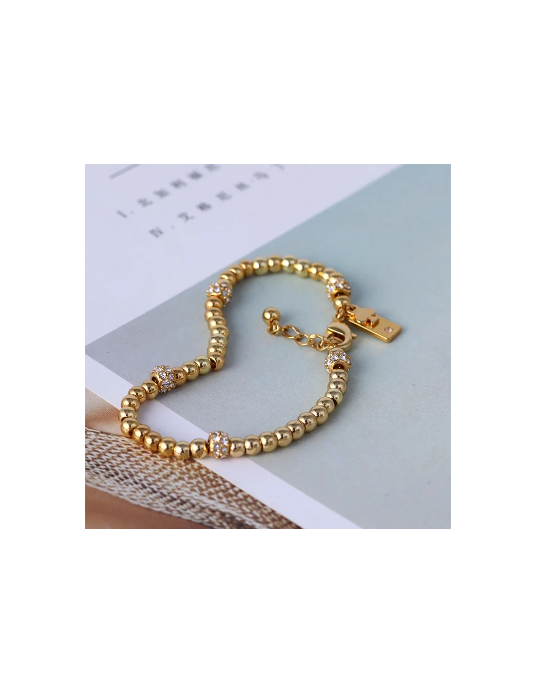 Bracelet Kate Spade New York en acier inoxydable doré vue 7