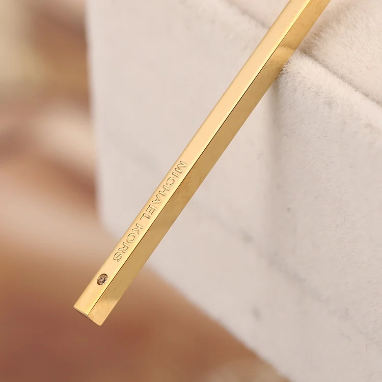 Collier Michael Kors Lariat MKJ4681710 avec barre pendante 3D en acier inoxydable doré vue 2