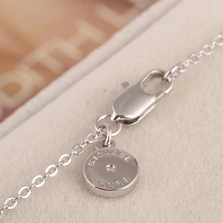 Collier Michael Kors MKJ3970040 en acier argenté pour femme, pendentif coeur orné de zirconiums vue 6